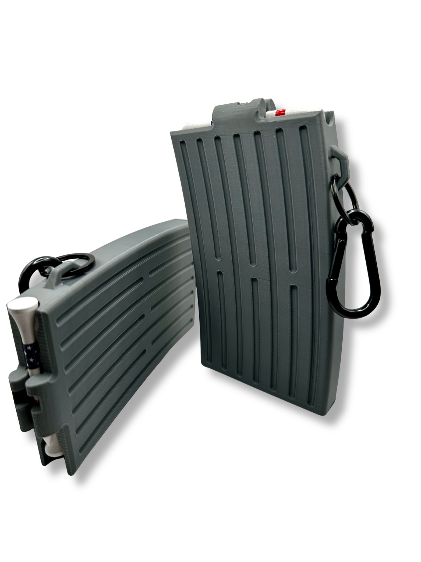 Grey golf tee dispenser for golf bags, a compact golf accessory that organizes tees and makes a unique golf gift for players.